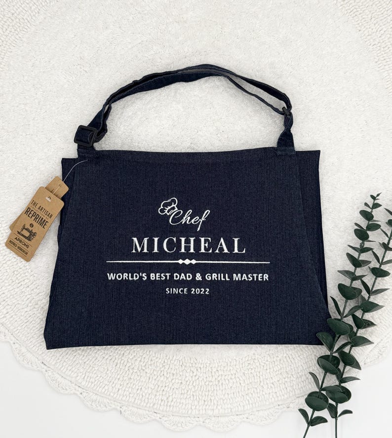 a black bag sitting on top of a white doily