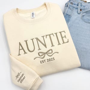 a pair of blue jeans and a white shirt