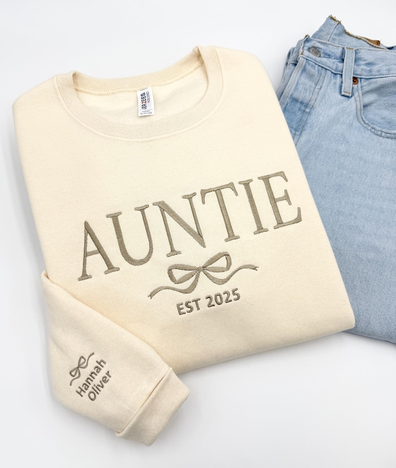 a pair of blue jeans and a white shirt