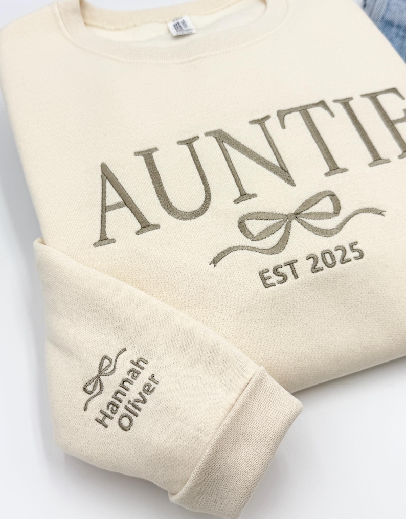 a white shirt with a bow on it