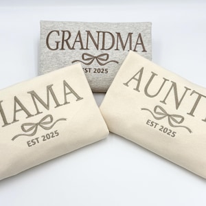 three personalized pillow cases sitting on top of a table