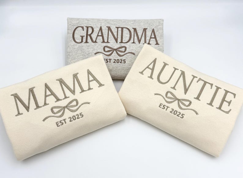 three personalized pillow cases sitting on top of a table