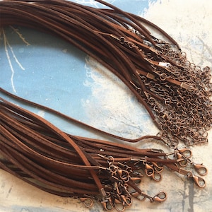 Antiqued copper finish-15pcs 12-24 inch adjustable 3x1.5mm flat dark brown suede necklace cords with lobster clasps and extention chains