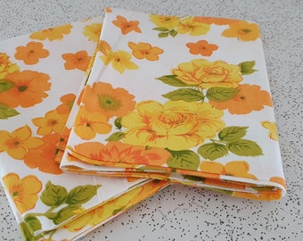flower power in orange and yellow...pair of 1970s vintage cotton pillowcases
