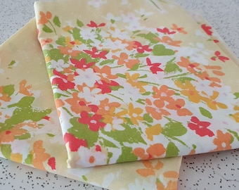 springtime floral in red, yellow and orange...pair of 1970s vintage pillowcases