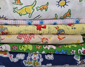 collection of 1970s vintage kids print fabrics