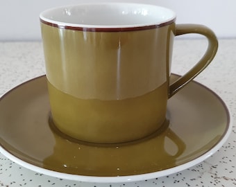 single 1970s vintage Kelco ceramic espresso cup and saucer in olive green