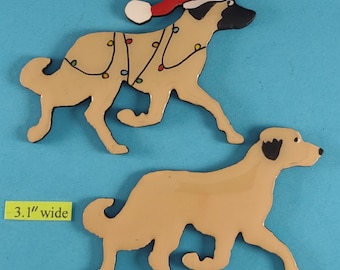May include: Two wooden dog cutouts. One dog is wearing a Santa hat and Christmas lights. The other dog is a solid tan colour. The width of the dog is 7.87 cm.