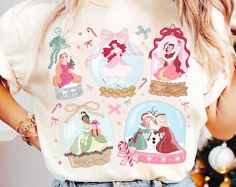 Coquette Bow Disney Princess Christmas Shirt, Mickey's Very Merry Christmas Party, Frozen Elsa Anna Olaf Belle Rapunzel Disney Girl Trip Tee