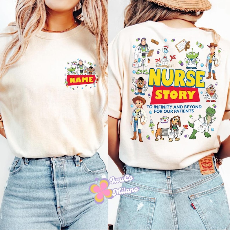 May include: Cream-colored t-shirt featuring a colorful graphic of cartoon characters and the text "NAME" on the front. The back of the shirt displays the words "NURSE STORY" with additional cartoon characters and the phrase "TO INFINITY AND BEYOND FOR OUR PATIENTS."