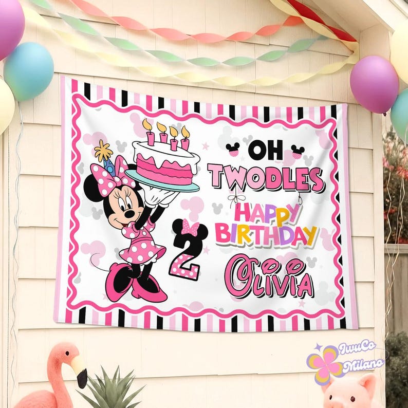 May include: A rectangular birthday banner featuring a white background with pink and black striped borders. It displays a cartoon mouse in a pink polka dot dress holding a cake, the text OH TWODLES HAPPY BIRTHDAY OLIVIA, and a large number 2.