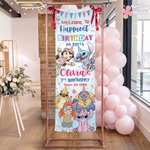 May include: A vertical rectangular birthday banner featuring Lilo and Stitch characters, with the text Welcome to Happiest Birthday on Earth, Olivia's 7th Birthday, and August 20, 2026. The banner is suspended by red ribbons on a copper metal frame.