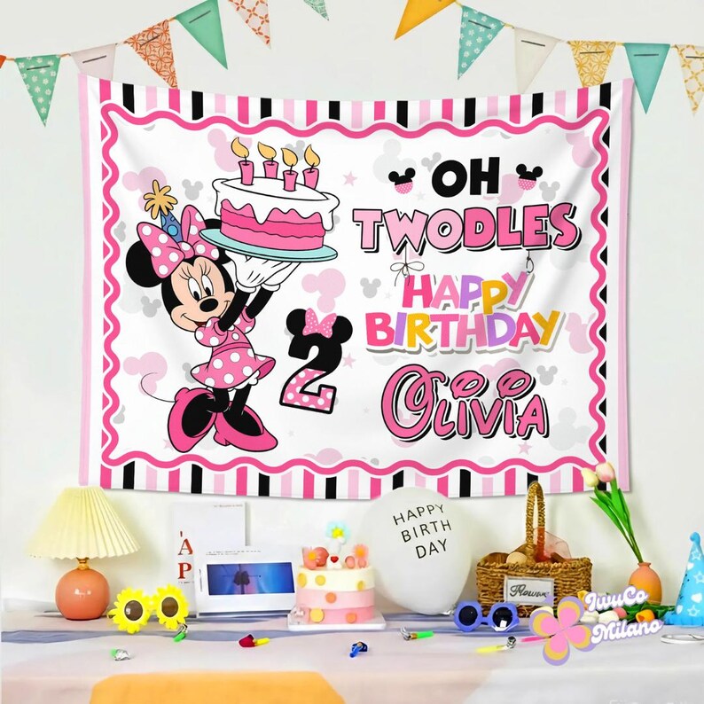 May include: A rectangular birthday backdrop featuring Minnie Mouse holding a cake, the text OH TWODLES HAPPY BIRTHDAY OLIVIA, and a large number 2. The banner has a pink, white, and black color scheme with a striped border and Minnie head silhouettes.