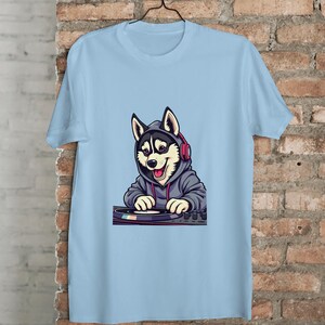 DJ Husky T-Shirt – Vibrant Animated Husky in Hoodie Spinning Music – Funny EDM Rave Dog Shirt – Gift for DJs, Dog Lovers & Music Fans
