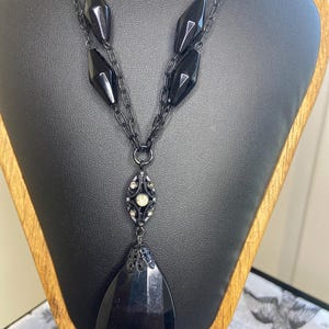 Timeless Drama | 22&quot; Double Strand Black Beaded Pendant Necklace