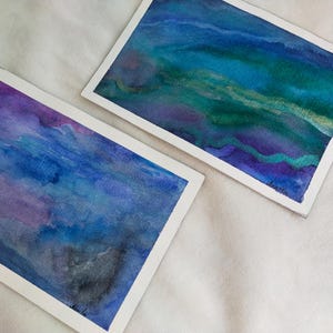Set di 2 cartoline acquerello galassia – Arte cosmica dipinta a mano con riflessi – Carta da lettere con retro scrivibile