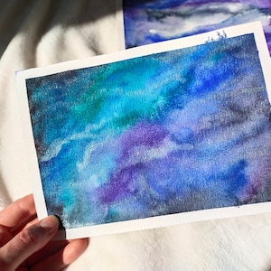 Set di 2 cartoline acquerello galassia – Arte cosmica dipinta a mano con riflessi – Carta da lettere con retro scrivibile