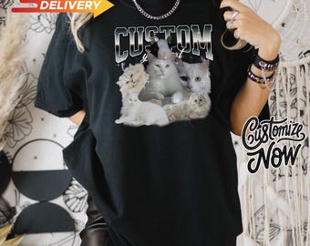 May include: Black t-shirt featuring a graphic of several white and gray cats with the text "CUSTOM your pet". The shirt also has a "Customize Now" graphic and a "Fast Delivery" banner.