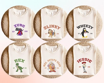 Camiseta gráfica retro de Toy Story: Slinky, Rex y Jessie