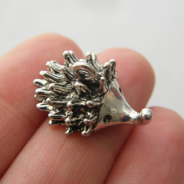 2 Hedgehog charms antique silver tone A653