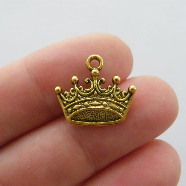 BULK 50 Crown charms antique gold tone CA42