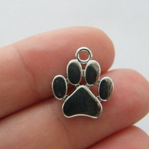 4 Paw print charms silver tone A485