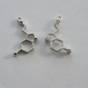 4 Serotonin charms silver tone MD47 image 4