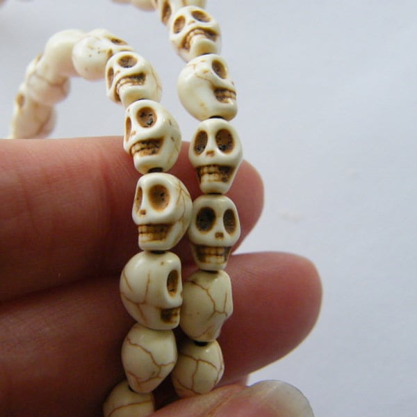 48 Off white skull beads 8 x 6mm SK27