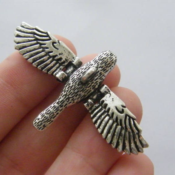 1 Bird movable wings charm antique silver tone B116