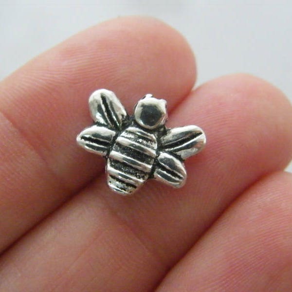 10 Bee spacer beads antique silver tone A549