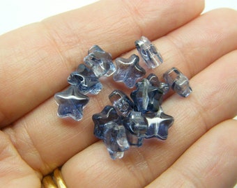 30 Star beads prussian blue glass AB226