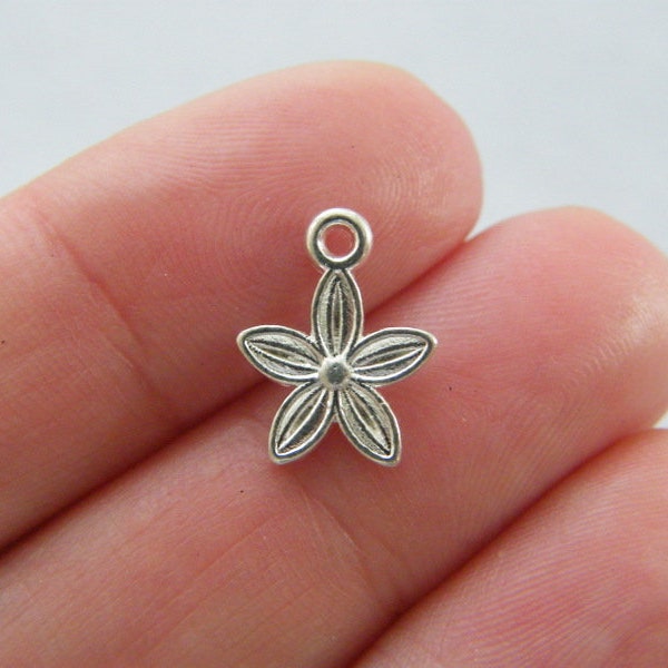 14 Flower  charms  silver plated tone F381