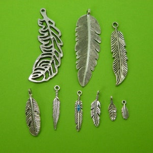 The Feather Collection - 9 antique silver tone charms