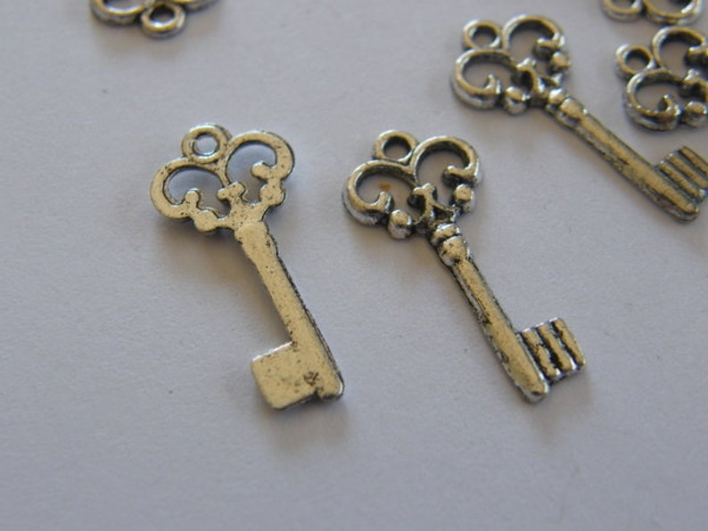 16 Key charms antique silver tone K4 image 5