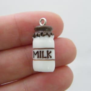 16 Milk charms white and brown resin FD433