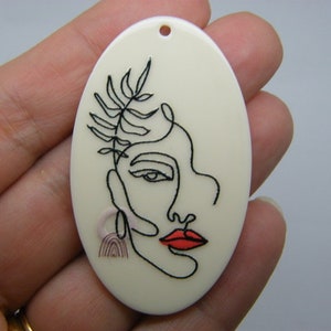 4 Lady woman face pendants resin P183