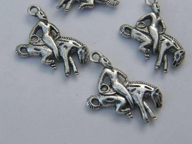 BULK 30 Rodeo charms antique silver tone A584
