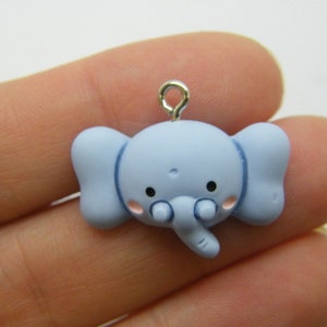 10 Elephant charms blue resin A778