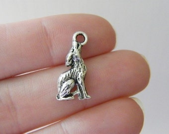 8 Wolf charms antique silver tone A285