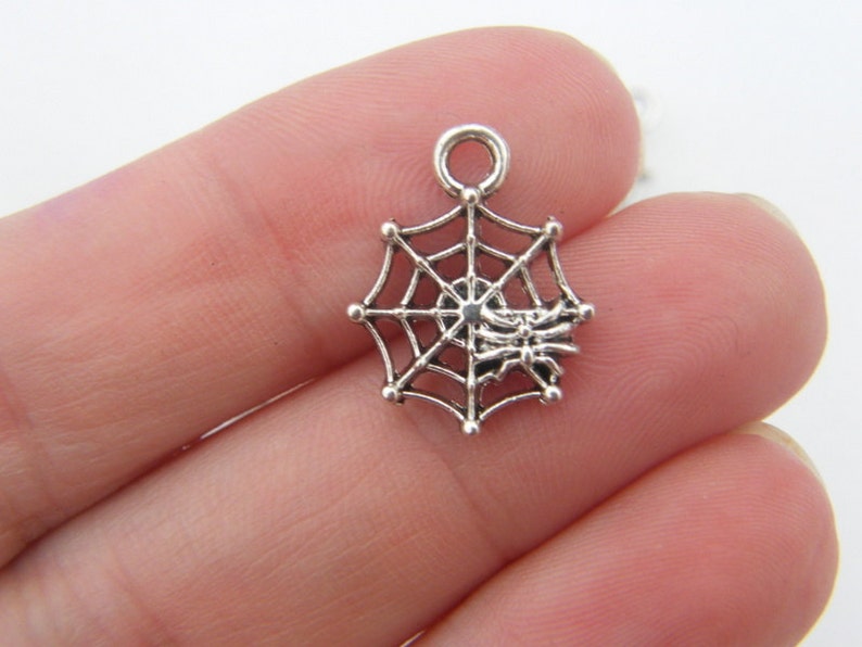 BULK 50 Spider in a spiderweb charms tibetan silver HC124