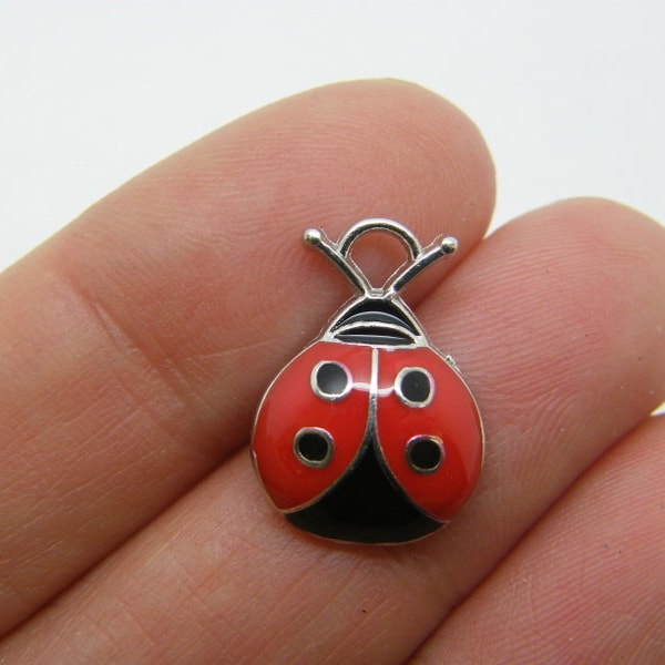 4 Ladybug charms black red  silver tone A343