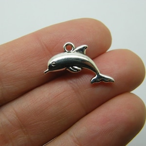 8 Dolphin charms antique silver tone FF129