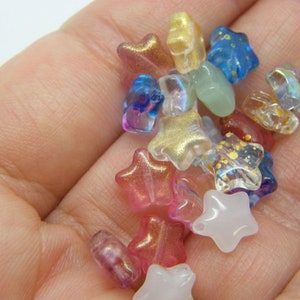 30 Star beads random glass AB437