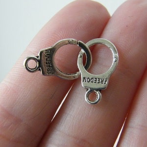 8 Handcuff connector charms antique silver tone G28