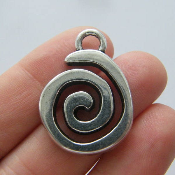 4 Spiral pattern charms antique silver tone M550