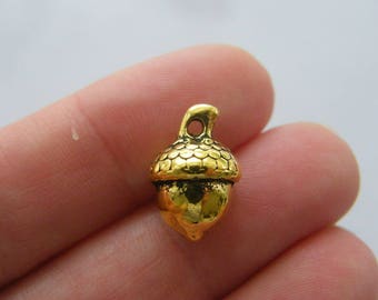 6 Acorn charms antique gold tone L83