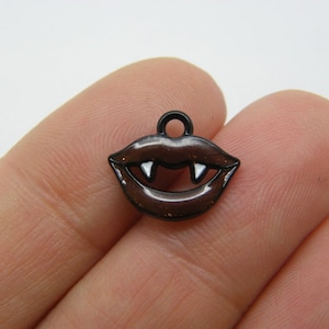 8 Vampire teeth fangs charms black and brown tone HC212
