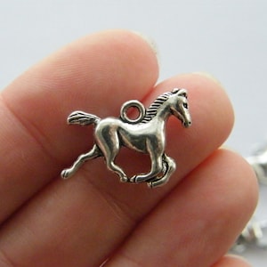 10 Horse charms antique silver tone A589