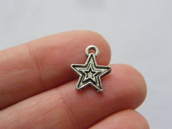 10 Fox charms tibetan silver A265