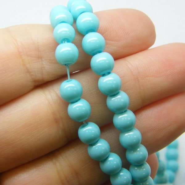 140 Blue 6mm beads glass B253